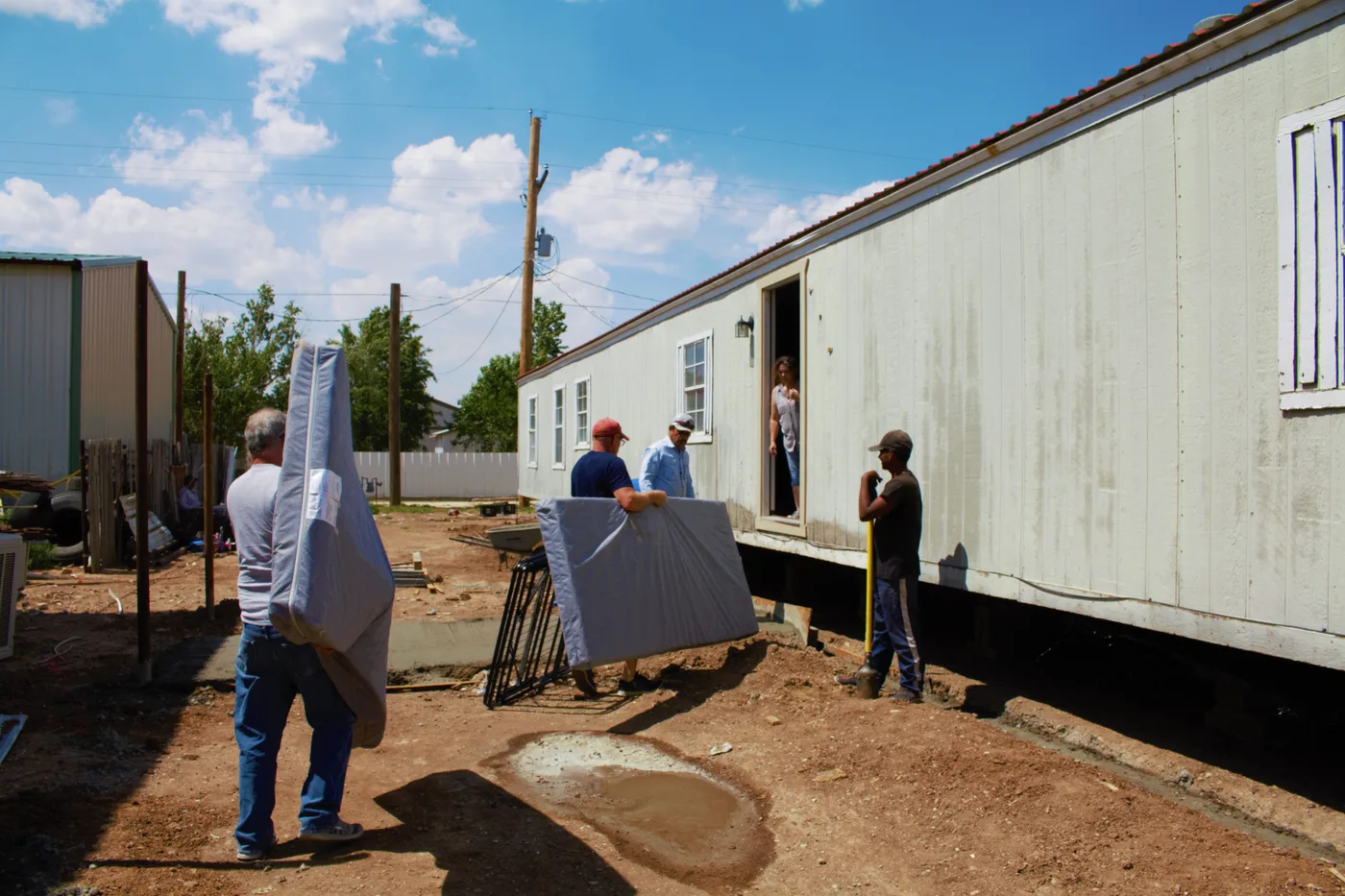 CNMC volunteers working on a family services project in Cactus, Texas